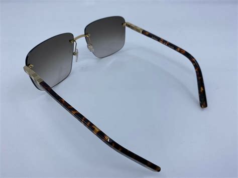 louis vuitton rimless sunglasses|louis vuitton reflective glasses.